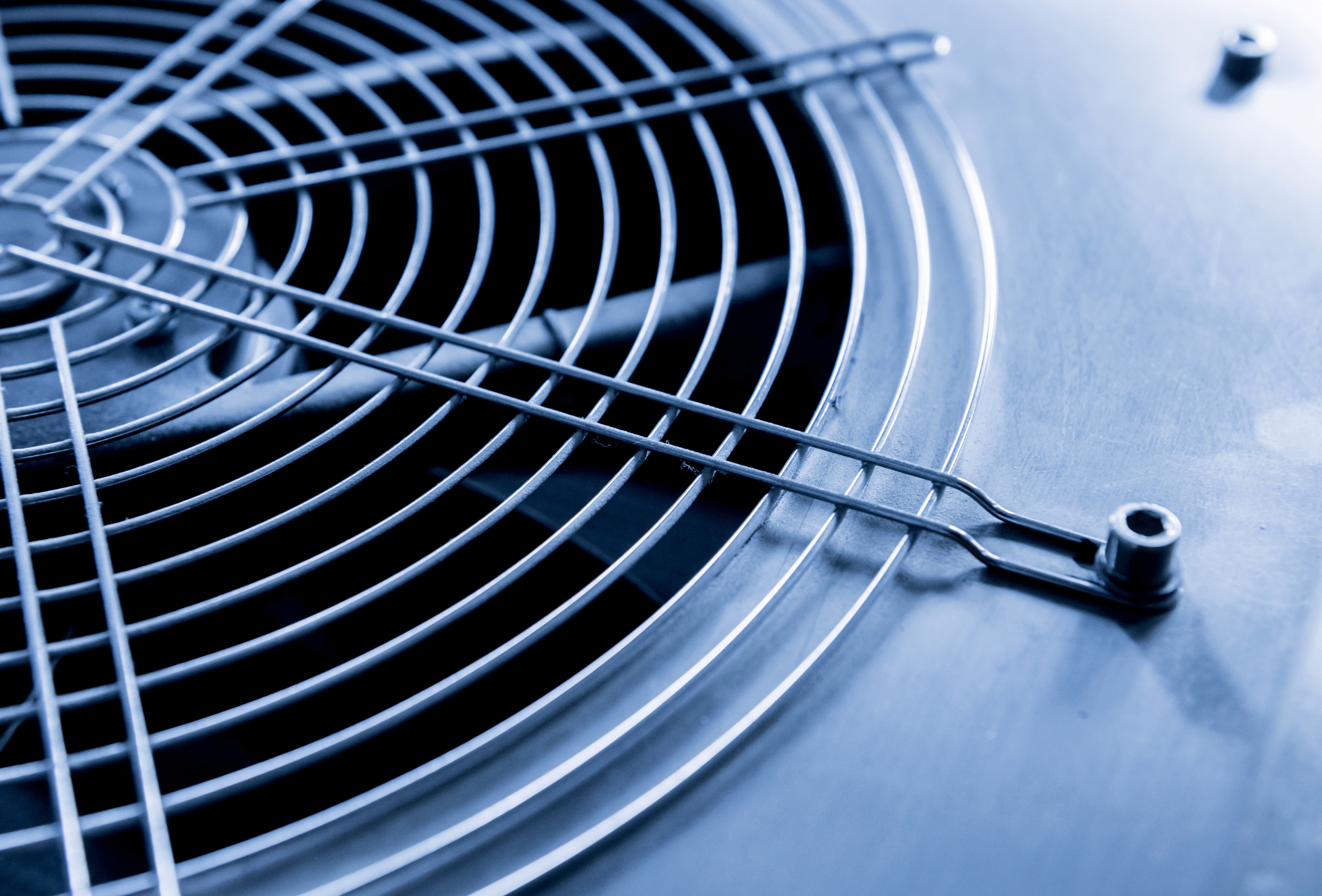 Close-up of an air conditioning condenser fan