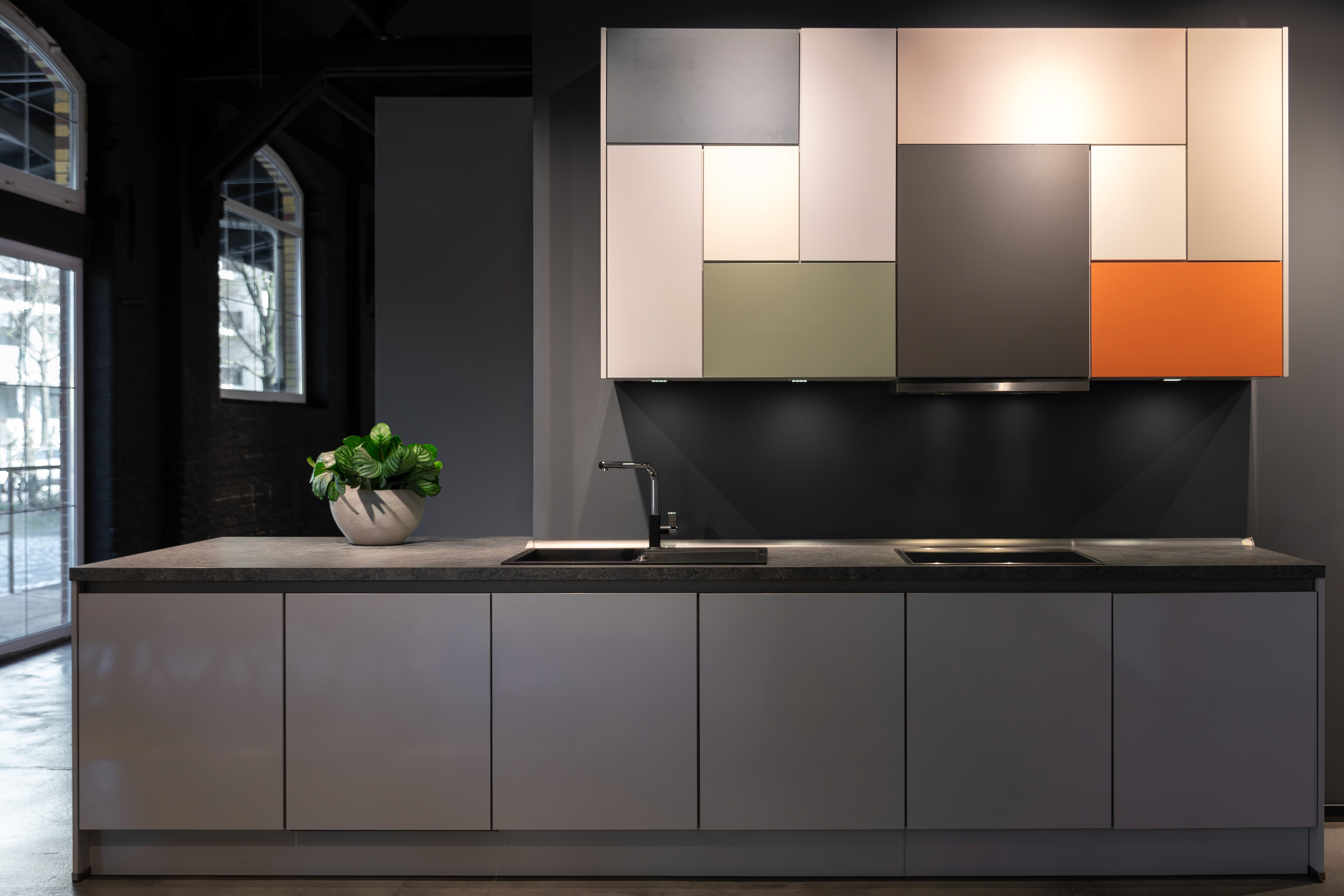 Kitchen renovation with colorful geometric cabinet panels
